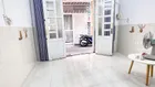 Cho thuê nhà 2 lầu gần mặt tiền đường Trần Phú Phường 2 Quận 5
