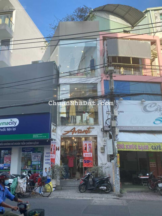 Định cư bán nhà góc 2 mặt tiền huỳnh văn bánh p12 Q phú nhuận.DT 5X20M kc 3 lầu giá 18 tỷ thuê 50 T